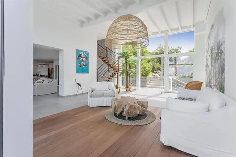 a bathroom with a tub and shower
