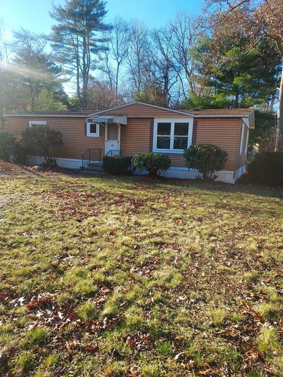 61 Longboat Road West Wareham, MA 02576 - Photo 1 of 15 front view of a house with a yard