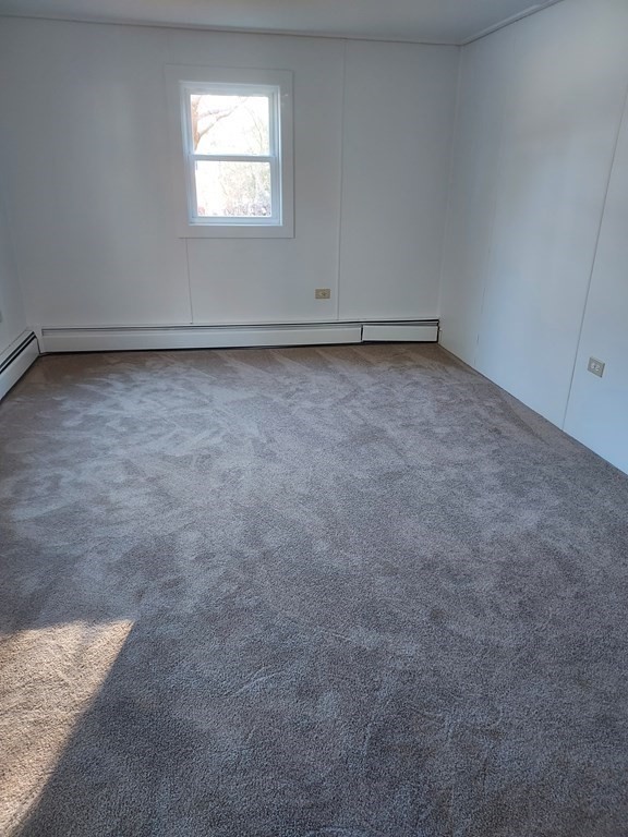 61 Longboat Road West Wareham, MA 02576 - Photo 15 of 15 an empty room with a window