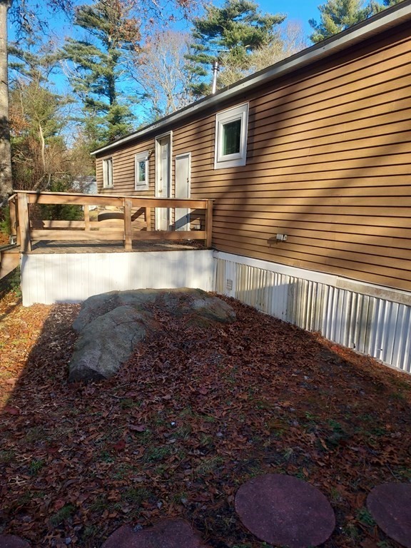 61 Longboat Road West Wareham, MA 02576 - Photo 3 of 15 a view of a house with a yard