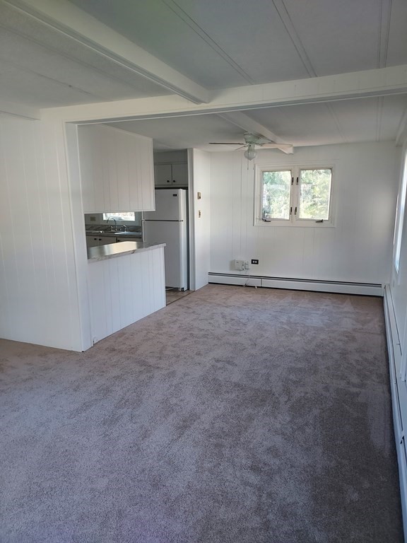 61 Longboat Road West Wareham, MA 02576 - Photo 5 of 15 a view of empty room with a kitchen