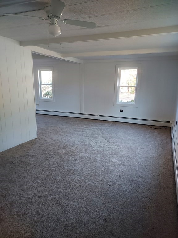 61 Longboat Road West Wareham, MA 02576 - Photo 6 of 15 a view of an empty room and window