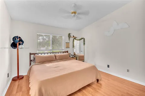 a bedroom with a bed and a closet