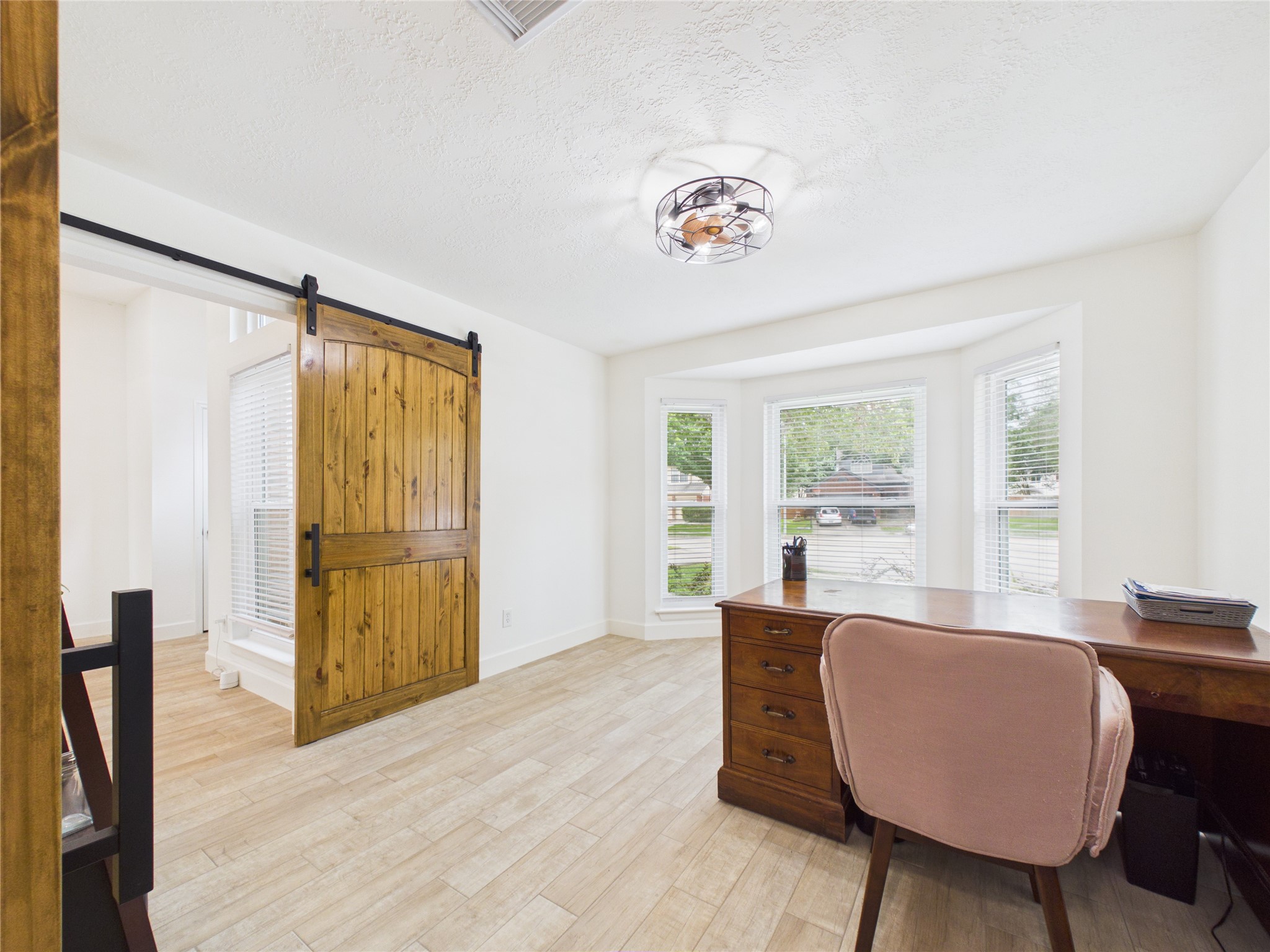 1210 Berkeley Lake Lane Houston, TX 77062 - Photo 11 of 21 Sliding barn doors give privacy