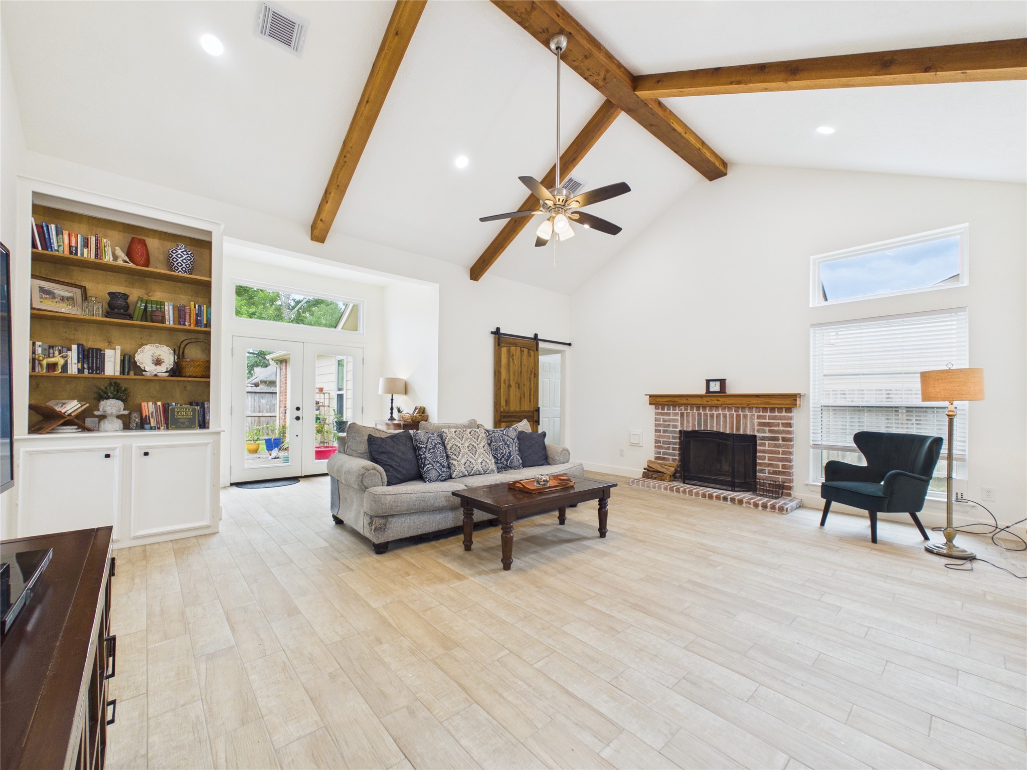 1210 Berkeley Lake Lane Houston, TX 77062 - Photo 5 of 21 Living Room boast of vaulted ceilings and cedar beams