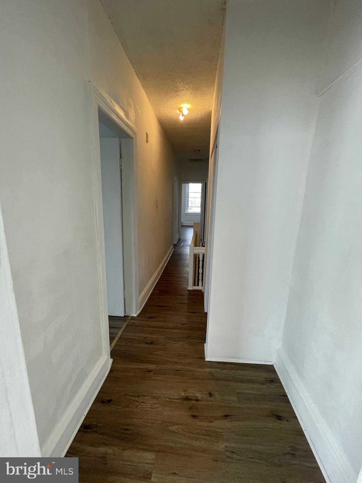 1426 Snyder Avenue Philadelphia, PA 19145 - Photo 3 of 16 a view of a hallway with wooden floor