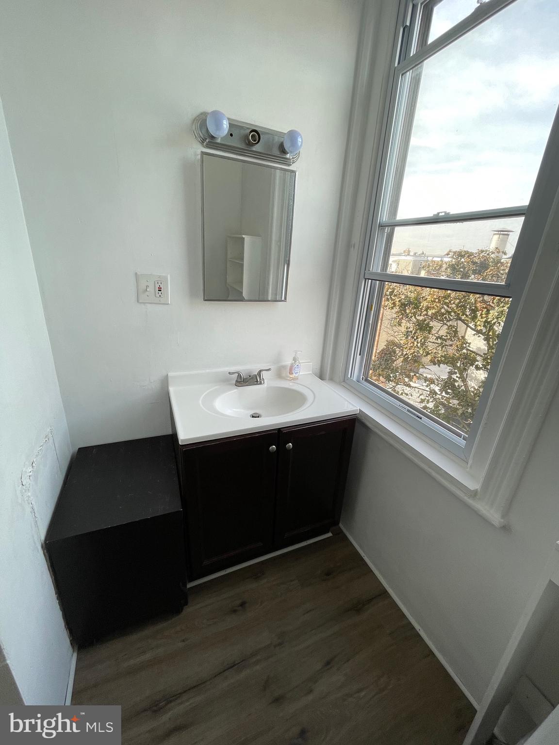 1426 Snyder Avenue Philadelphia, PA 19145 - Photo 6 of 16 a en suite bathroom with a sink and a mirror
