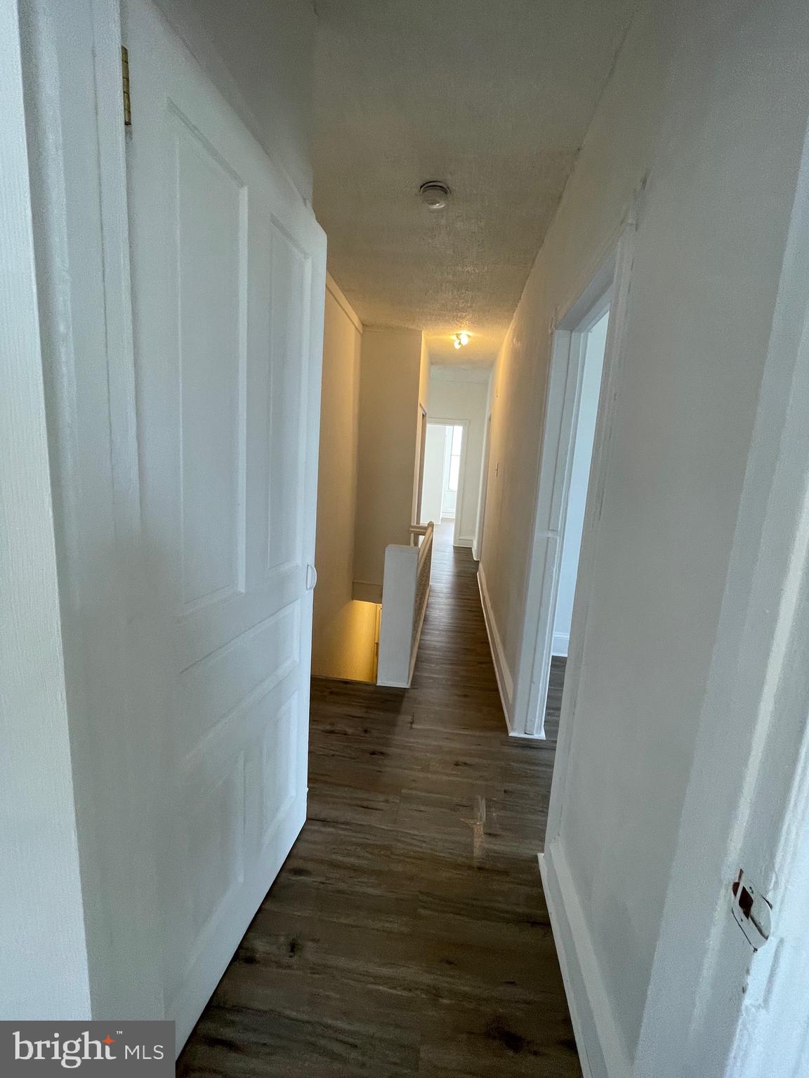 1426 Snyder Avenue Philadelphia, PA 19145 - Photo 9 of 16 a view of a hallway with wooden floor
