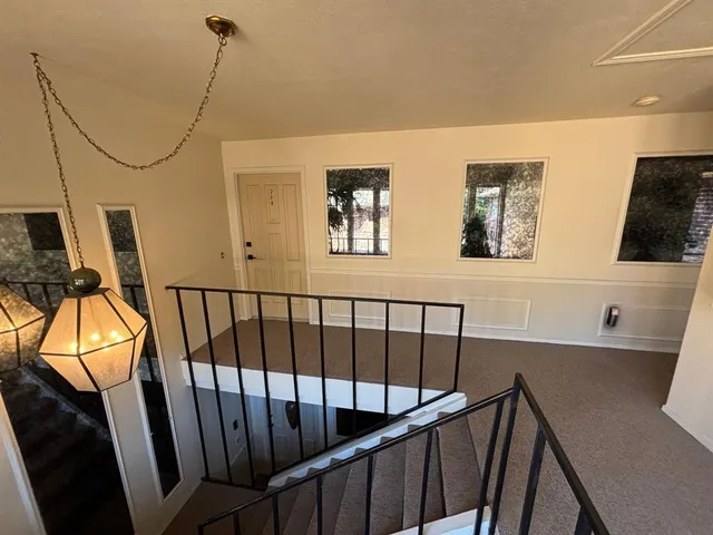 a bed room with a bed and a window