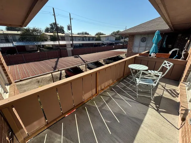 a view of a swimming pool with chairs