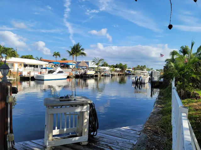 a view of a lake with sitting area