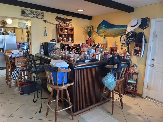 a view of a chairs and tables in a room