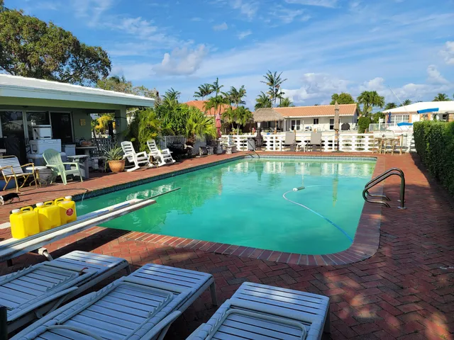a view of a swimming pool with a patio
