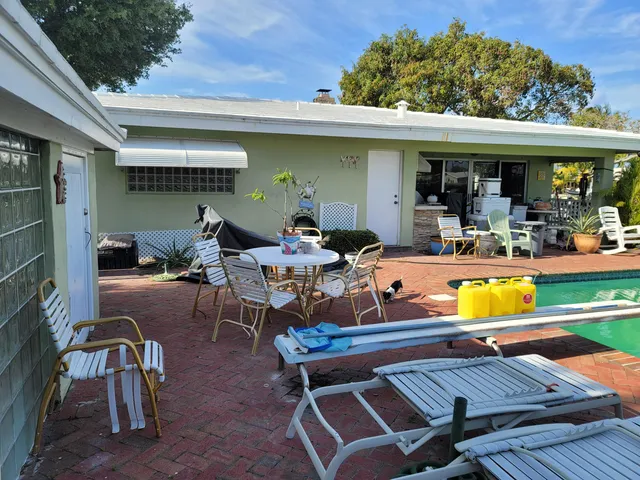 a view of a garage with a patio