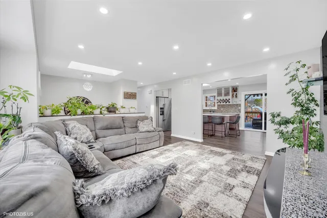 an aerial view of city and lake