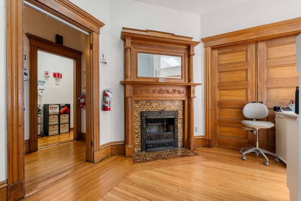 826 Broadway Everett, MA 02149 - Photo 14 of 41 a view of livingroom with furniture and a fireplace