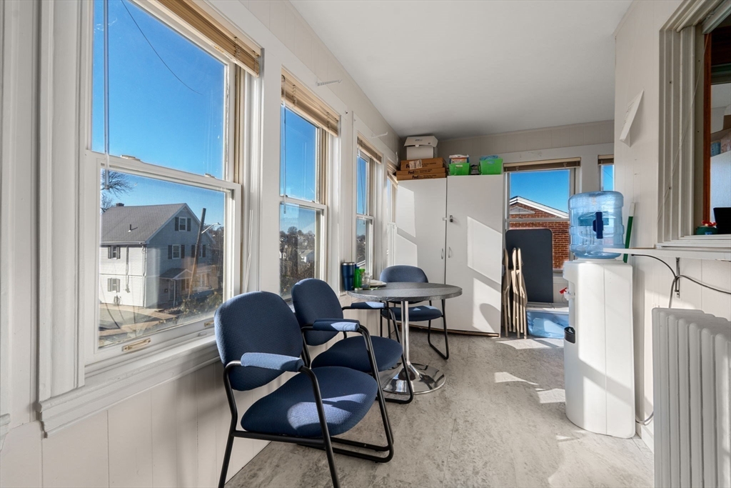 826 Broadway Everett, MA 02149 - Photo 21 of 41 a living room with furniture and a large window