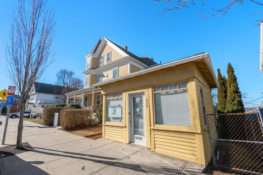 826 Broadway Everett, MA 02149 - Photo 35 of 41 a view of a house with wooden fence