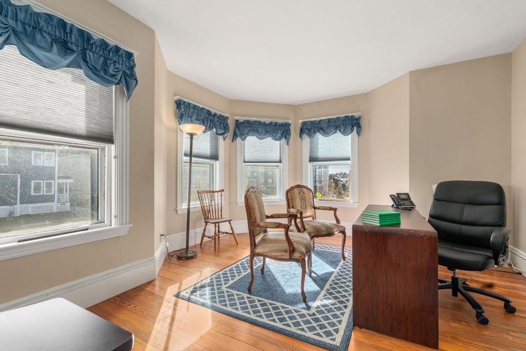 826 Broadway Everett, MA 02149 - Photo 4 of 41 a living room with furniture and a window