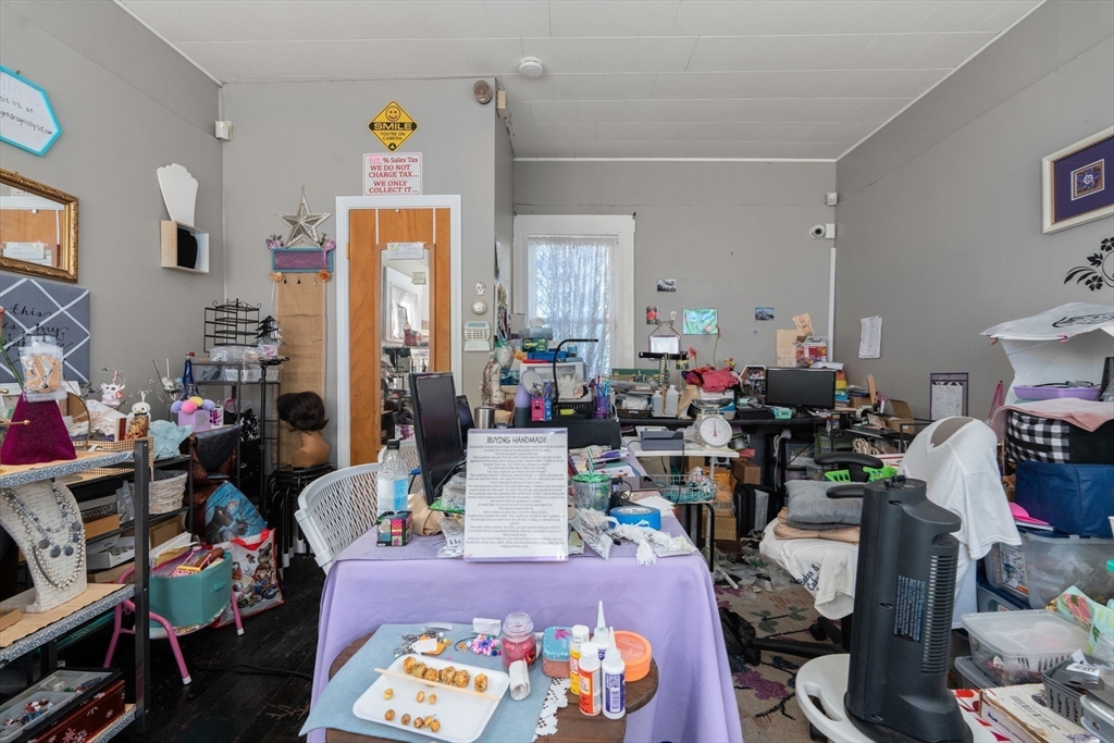 826 Broadway Everett, MA 02149 - Photo 8 of 41 a very nice looking room with many windows and plants