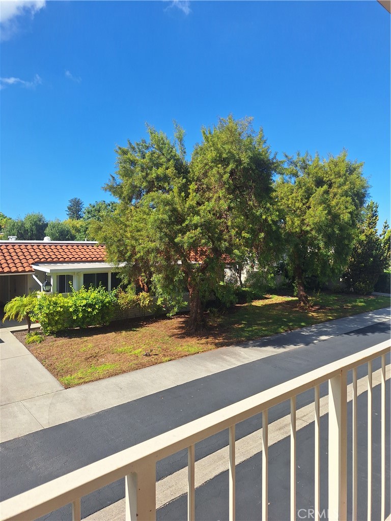 a view of a house with a street