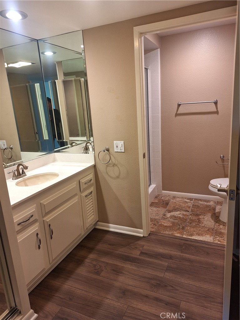 2139-unit A Ronda Granada, Unit A Laguna Woods, CA 92637 - Photo 3 of 8 a bathroom with a sink and a mirror