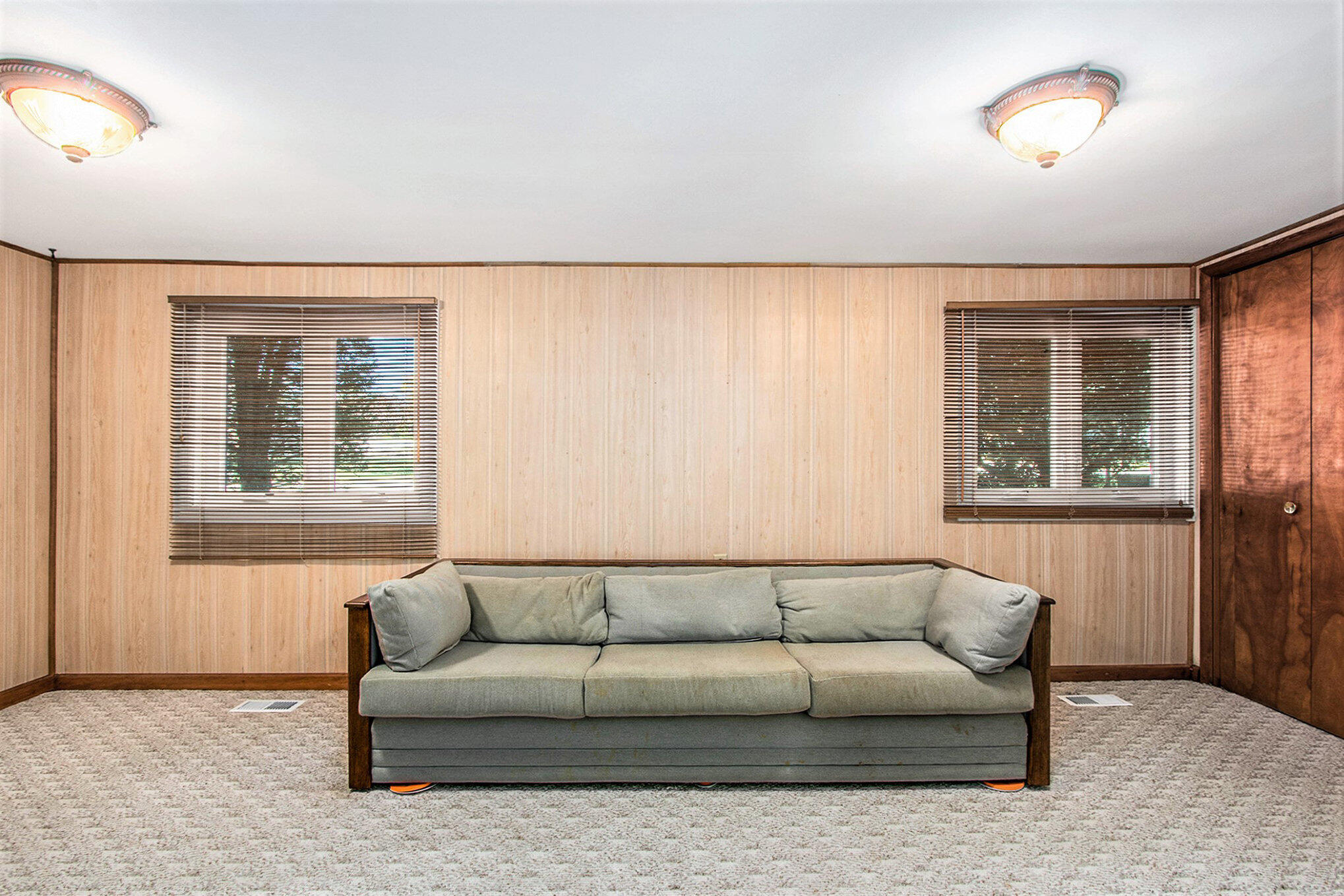 1803 West 95th Court Crown Point, IN 46307 - Photo 22 of 26 a living room with furniture and a window