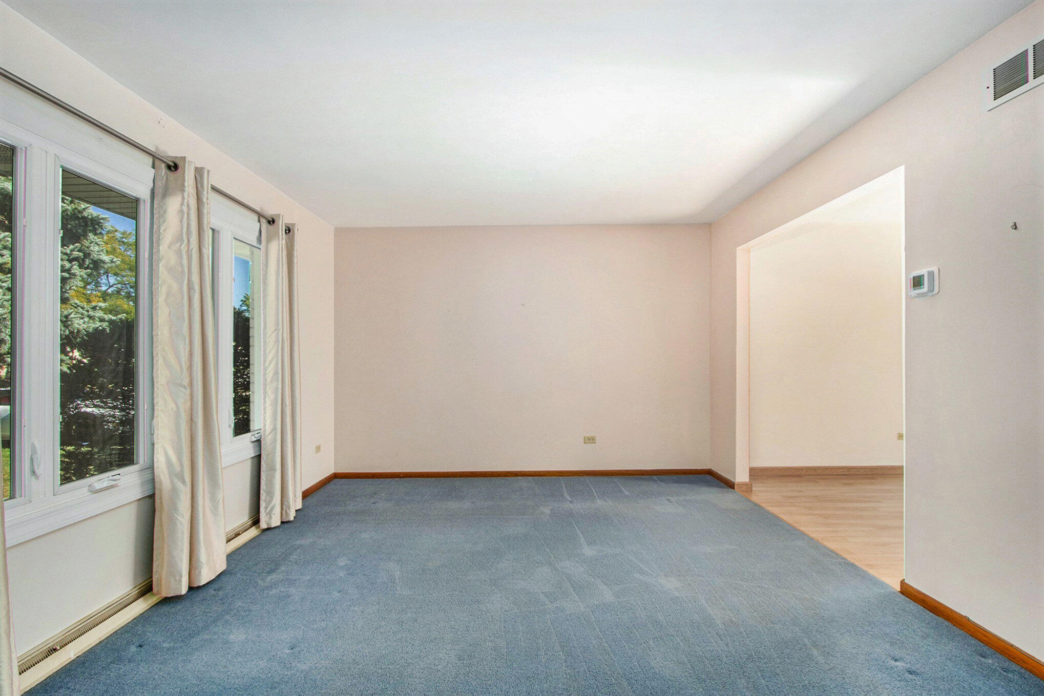1803 West 95th Court Crown Point, IN 46307 - Photo 6 of 26 a view of an empty room with a window