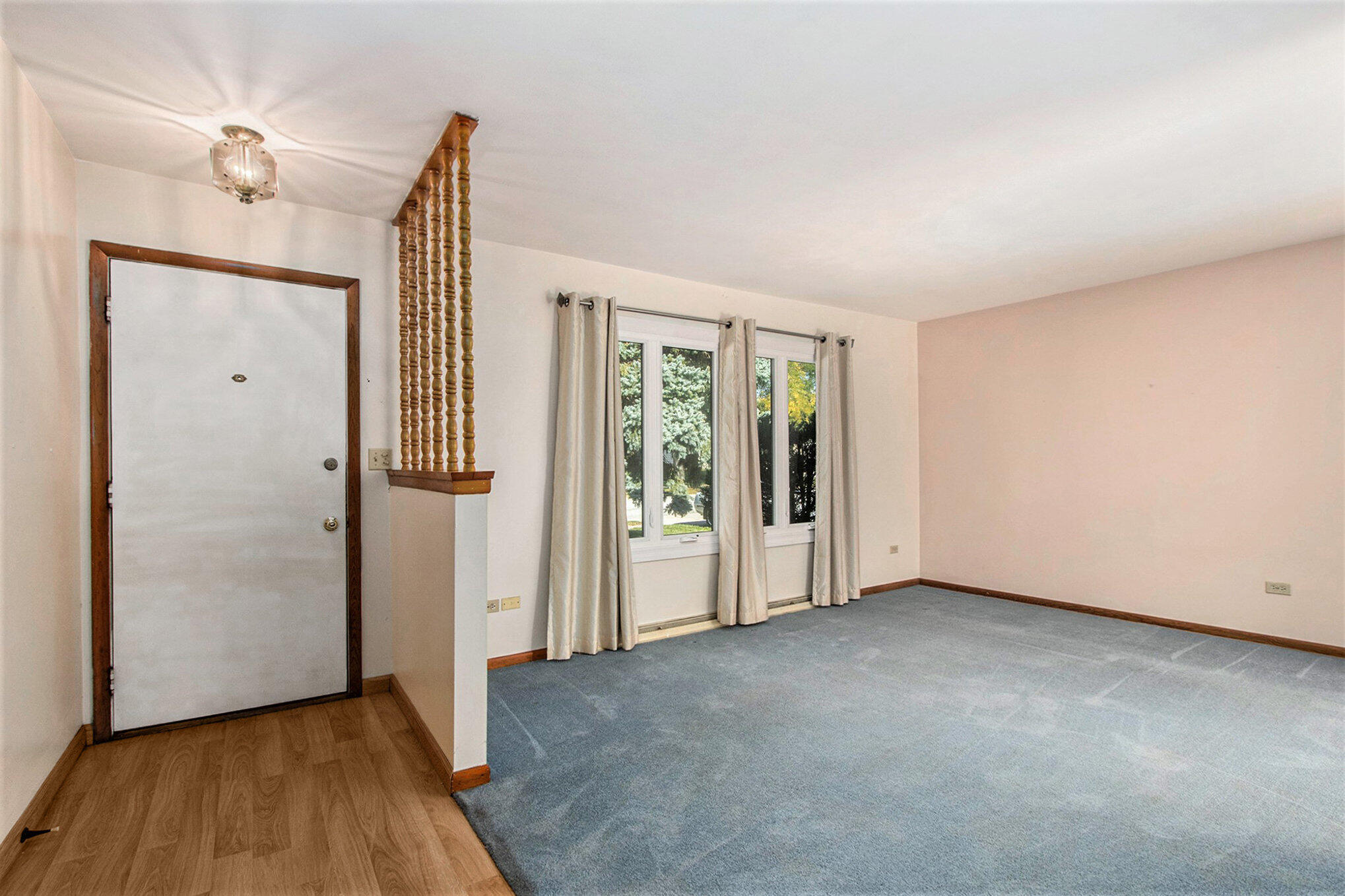 1803 West 95th Court Crown Point, IN 46307 - Photo 7 of 26 a view of an empty room with glass door