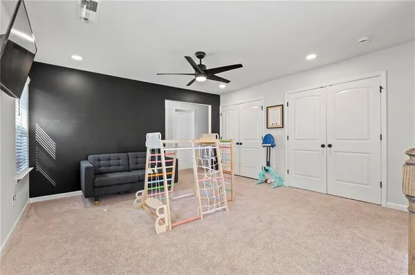 a view of a livingroom with furniture