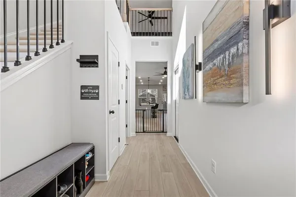 a view of a hallway with entryway