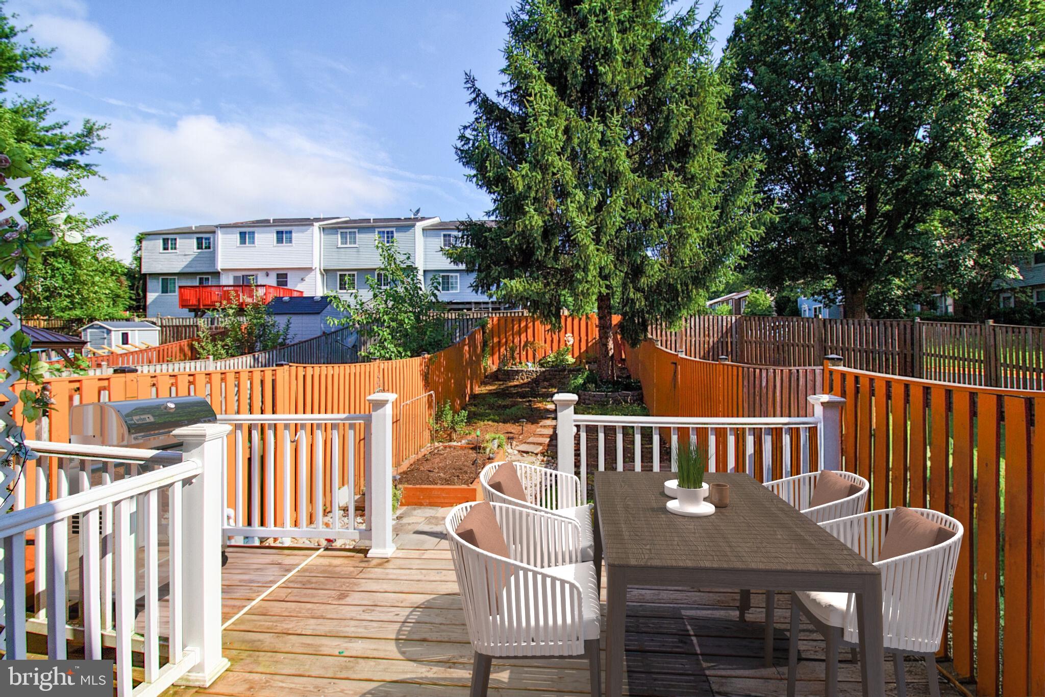 1456 Farmcrest Way Silver Spring, MD 20905 - Photo 20 of 24 a view of a chairs and table in the patio