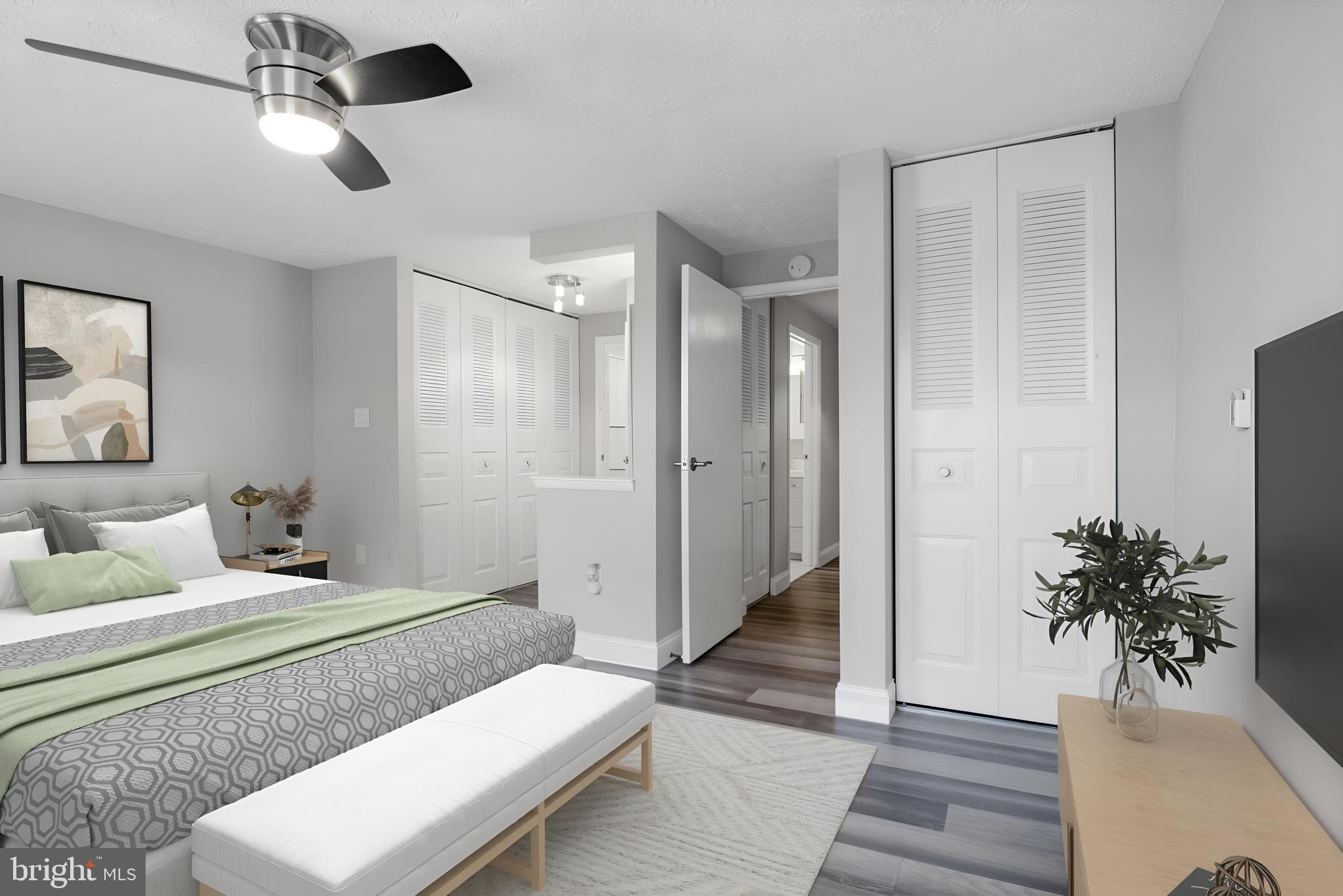 1456 Farmcrest Way Silver Spring, MD 20905 - Photo 10 of 24 a bedroom with bed and a chandelier