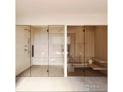 a bathroom with a glass shower door