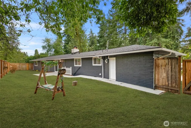 a house view with a backyard space