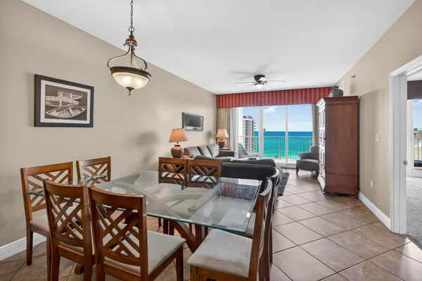 a view of a dining room with furniture window and outside view
