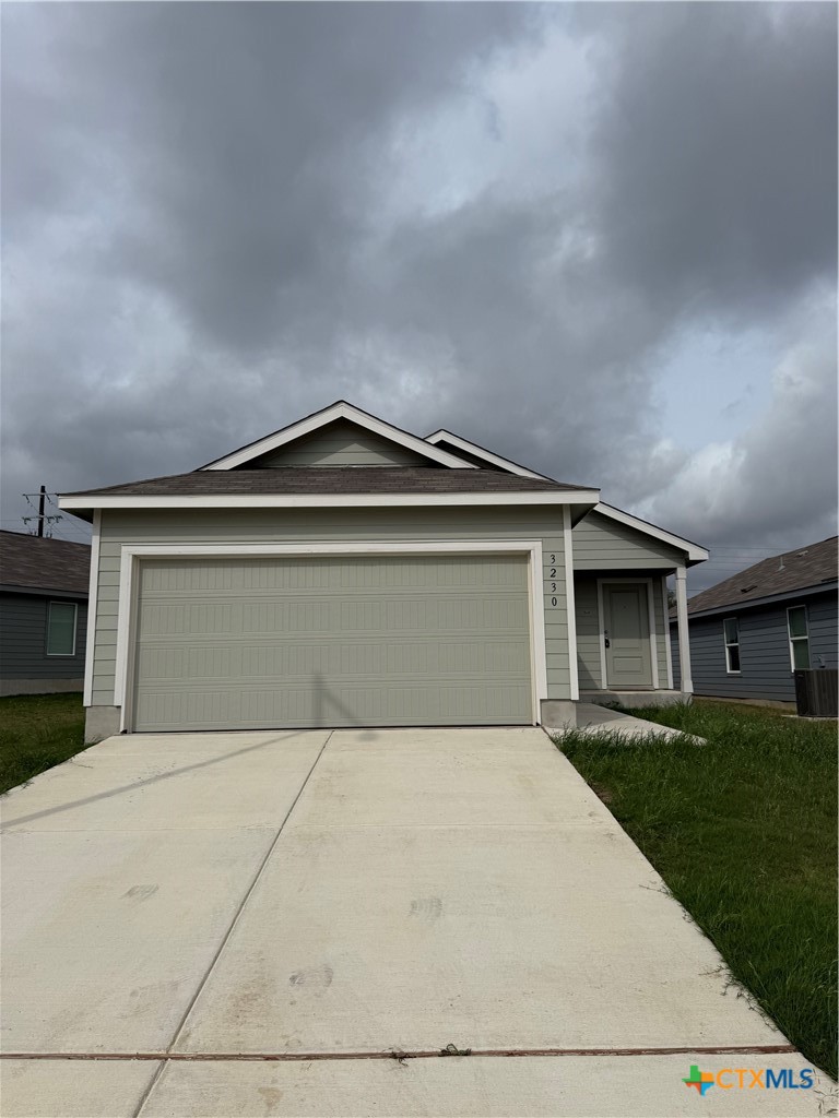 a front view of a house with yard