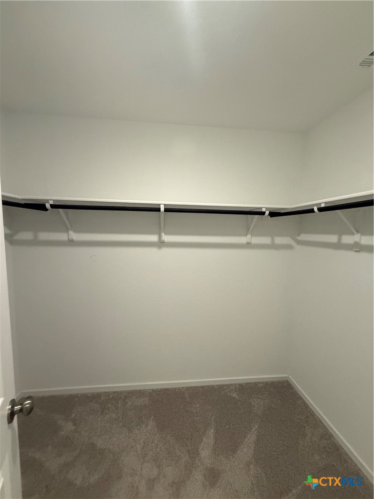 3230 Mound Ridge New Braunfels, TX 78130 - Photo 11 of 15 a view of a room with racks on the wall