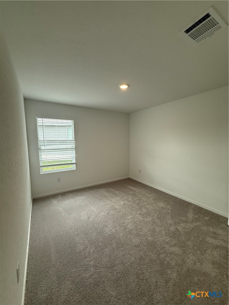 3230 Mound Ridge New Braunfels, TX 78130 - Photo 7 of 15 an empty room with closet and windows