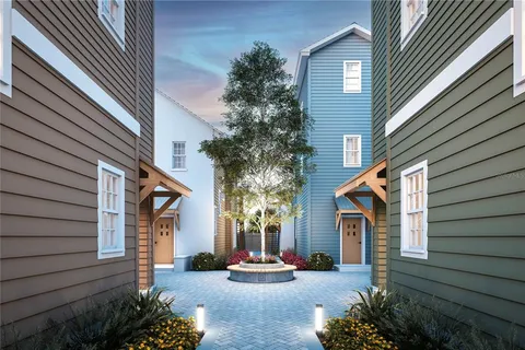 a front view of a house with a garage