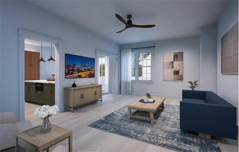 a living room with furniture and window