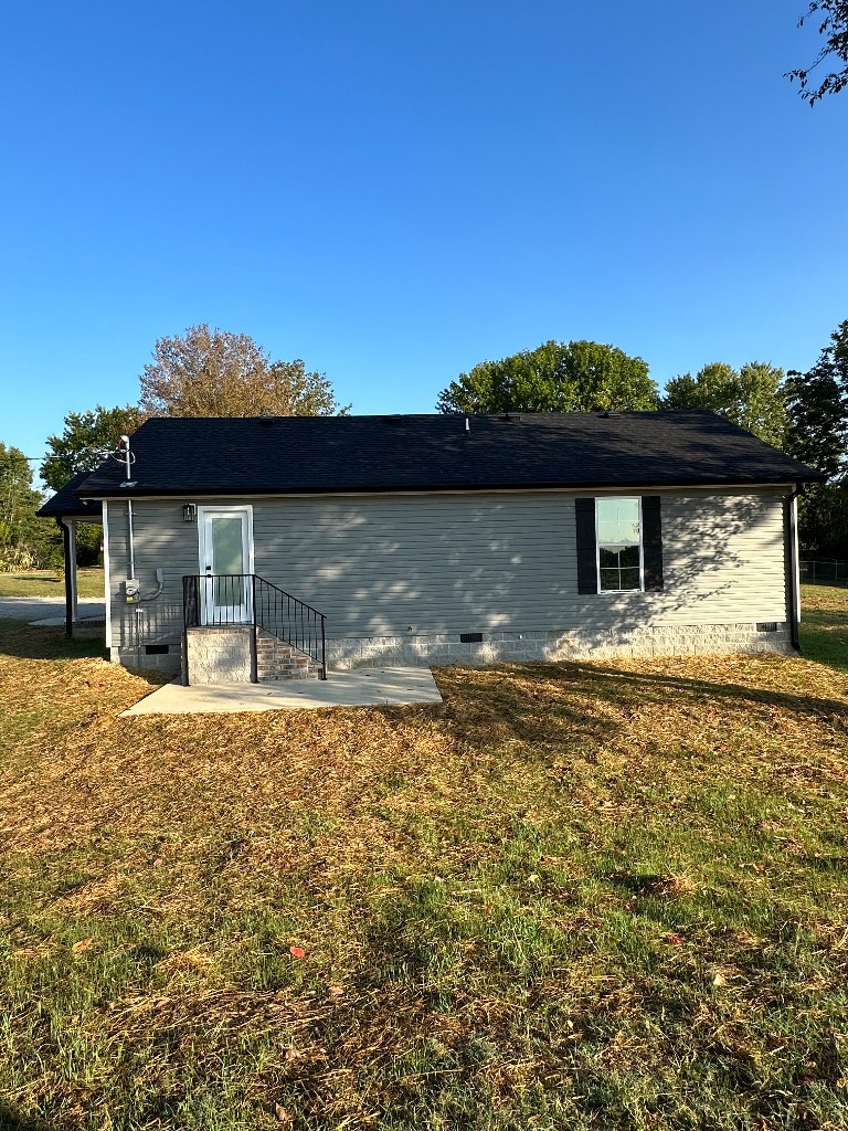 1295 Bethel Road Pulaski, TN 38478 - Photo 16 of 17 a front view of a house with a yard