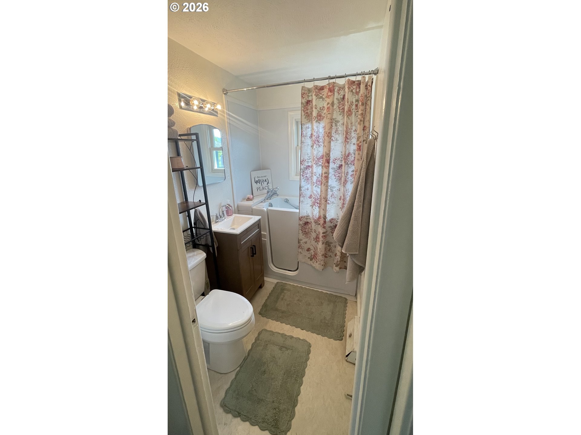 6404 Lookingglass Road Roseburg, OR 97471 - Photo 45 of 48 a bathroom with a toilet and a sink