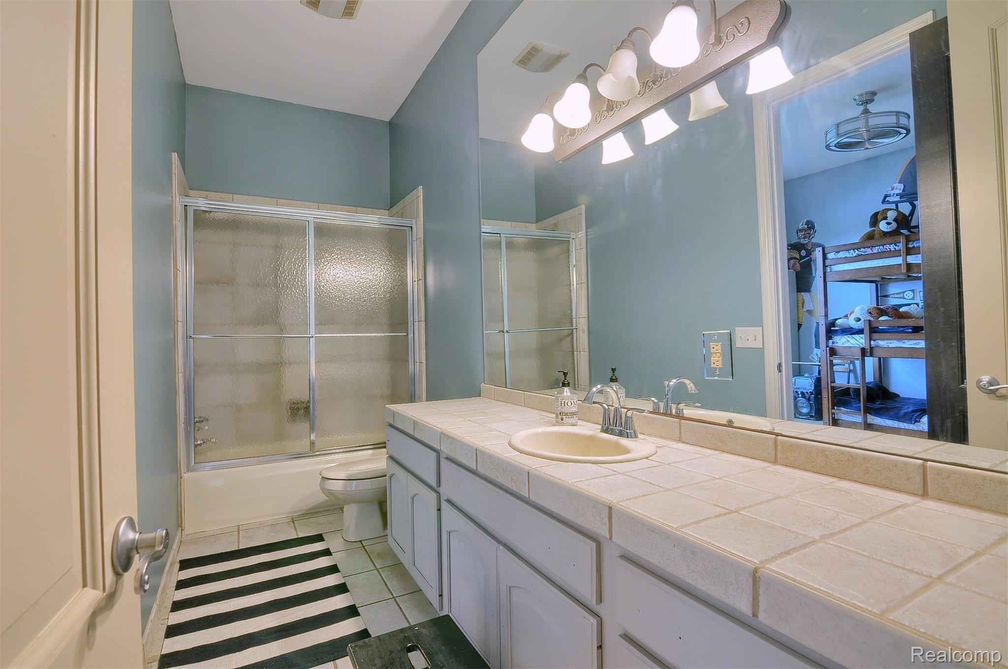 8311 Waumegah Road Clarkston, MI 48348 - Photo 27 of 61 29-2nd-Bedroom-Bathroom.jpg