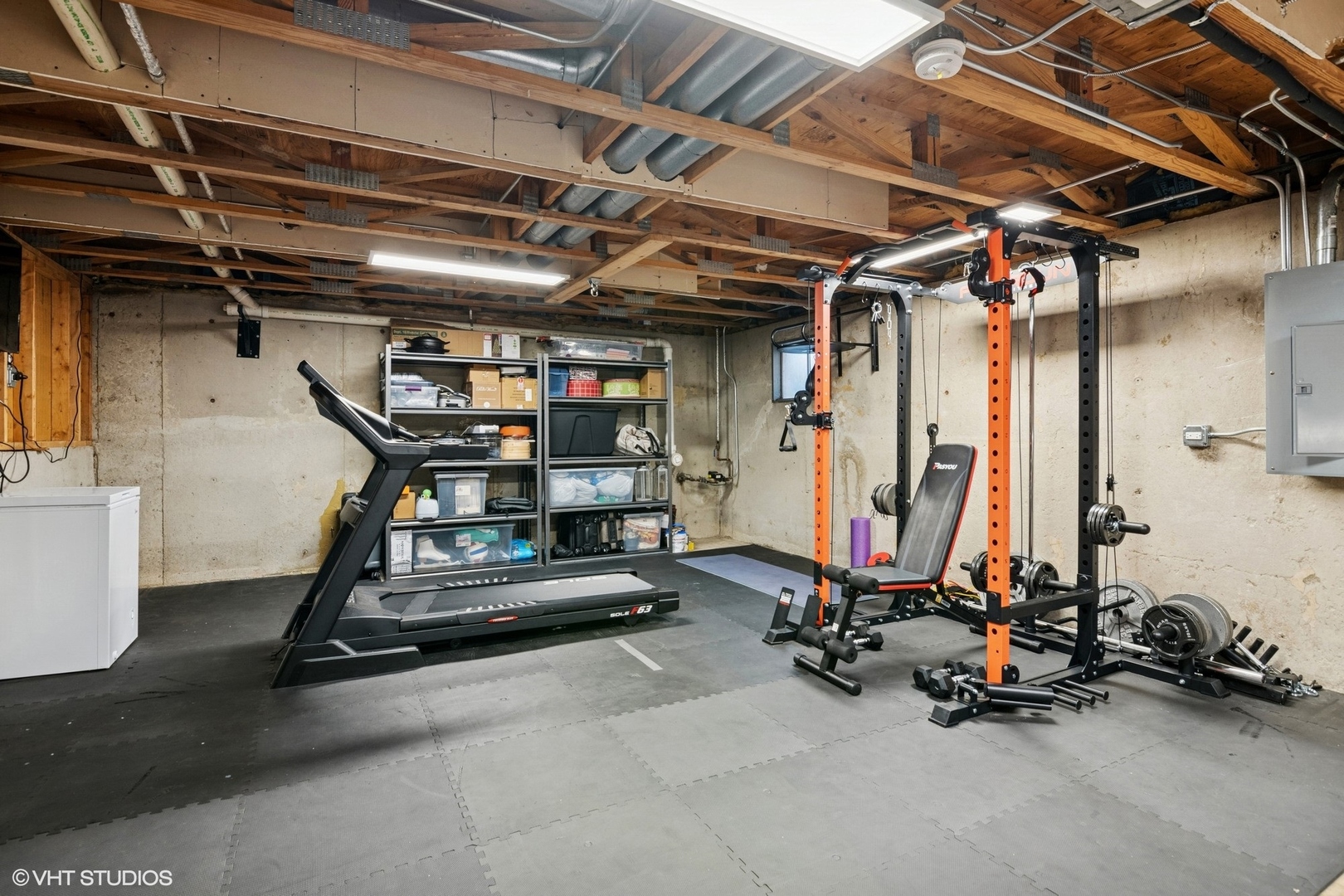 N101 Pleasant Hill Road Wheaton, IL 60187 - Photo 18 of 29 a view of a room with gym equipment