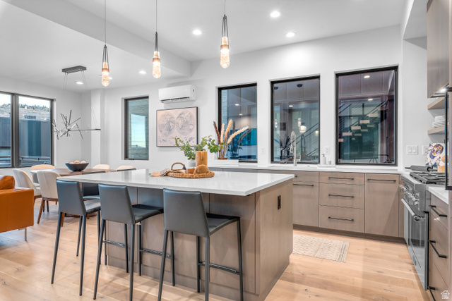 1258 Rothwell Road Park City, UT 84060 - Photo 7 of 48 Expansive kitchen island with a light-toned countertop and integrated seating