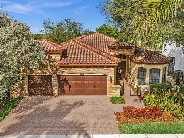 front view of a house with a garden