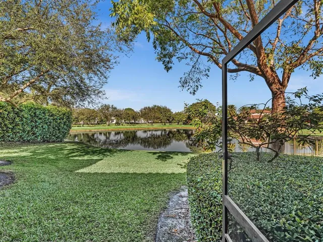 a spacious bedroom with a bed and furniture