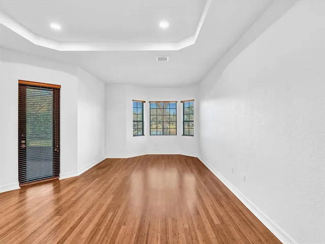a bathroom with a shower and a mirror