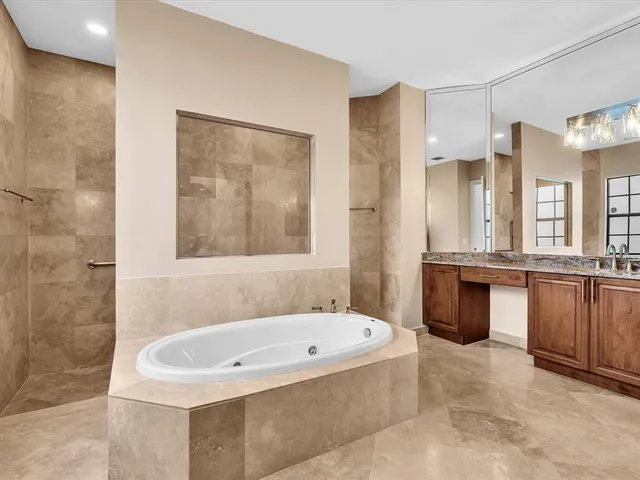 a bathroom with a toilet and shower